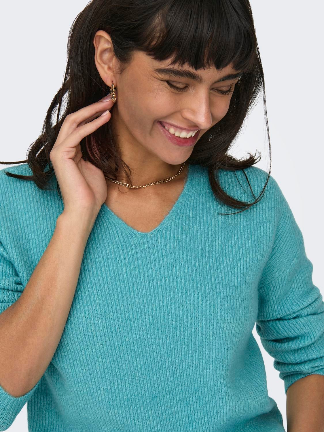 Turquoise v neck outlet sweater