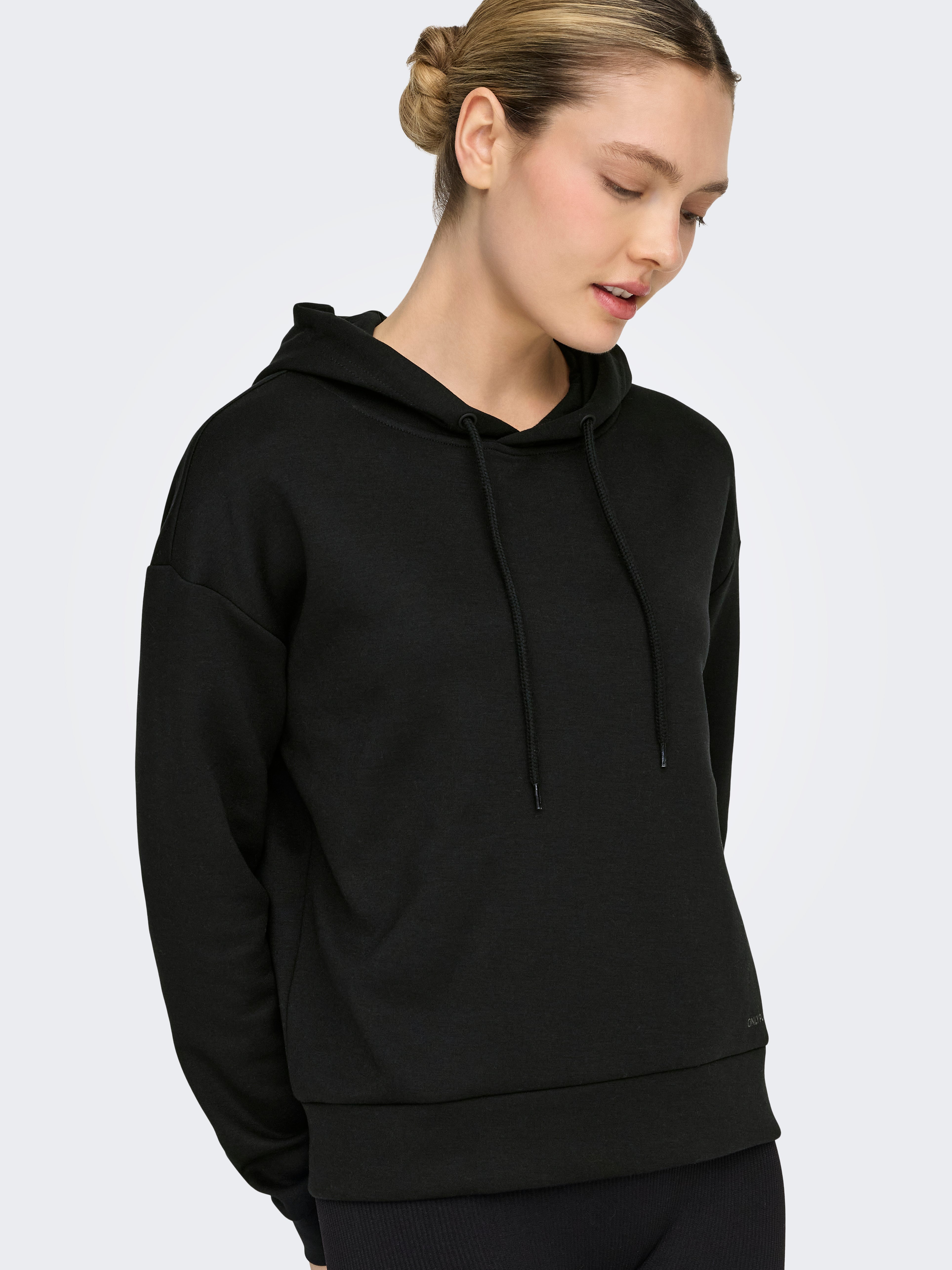 Sweat à capuche décontracté de couleur unie