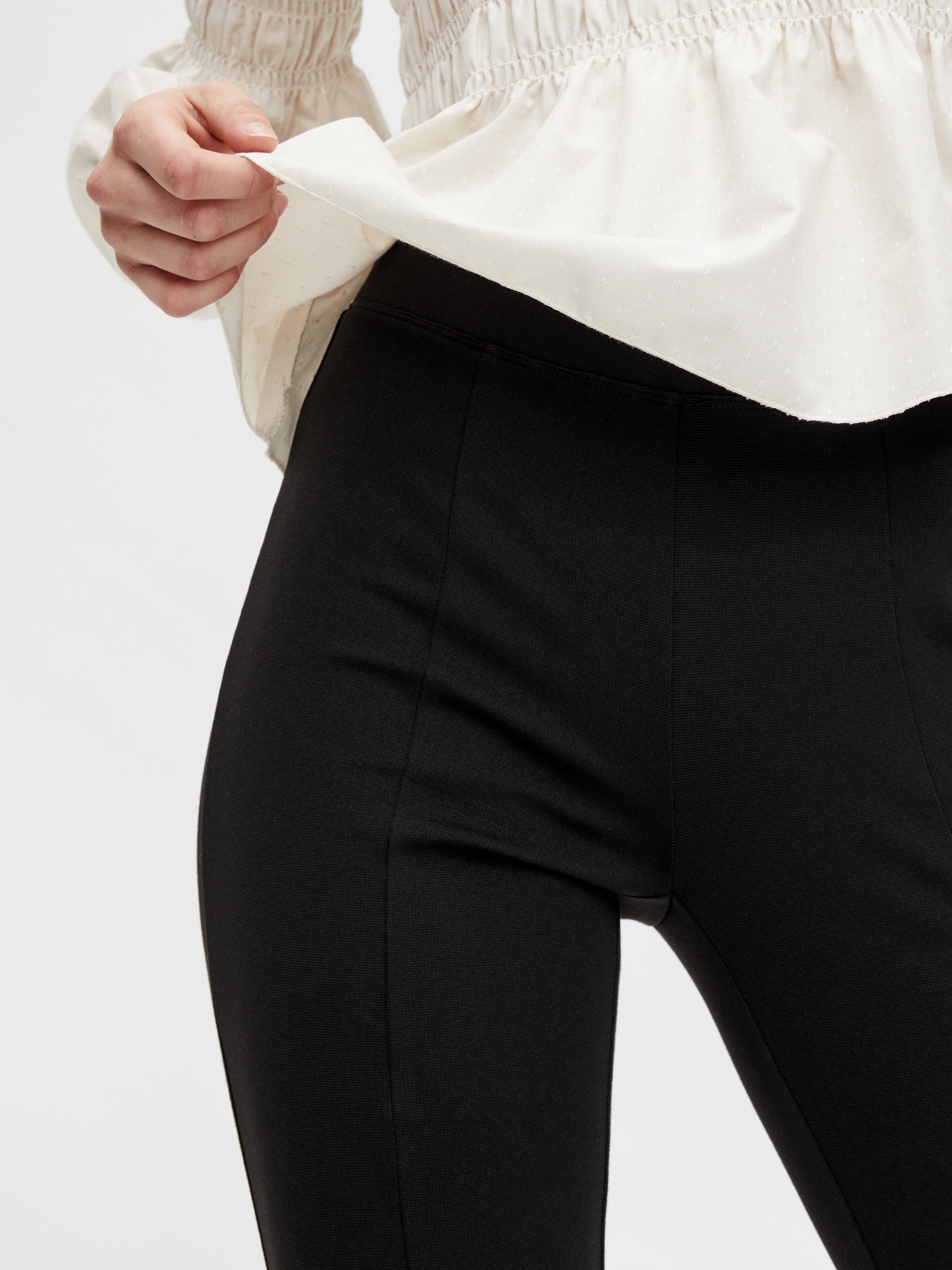 black pants with front slits