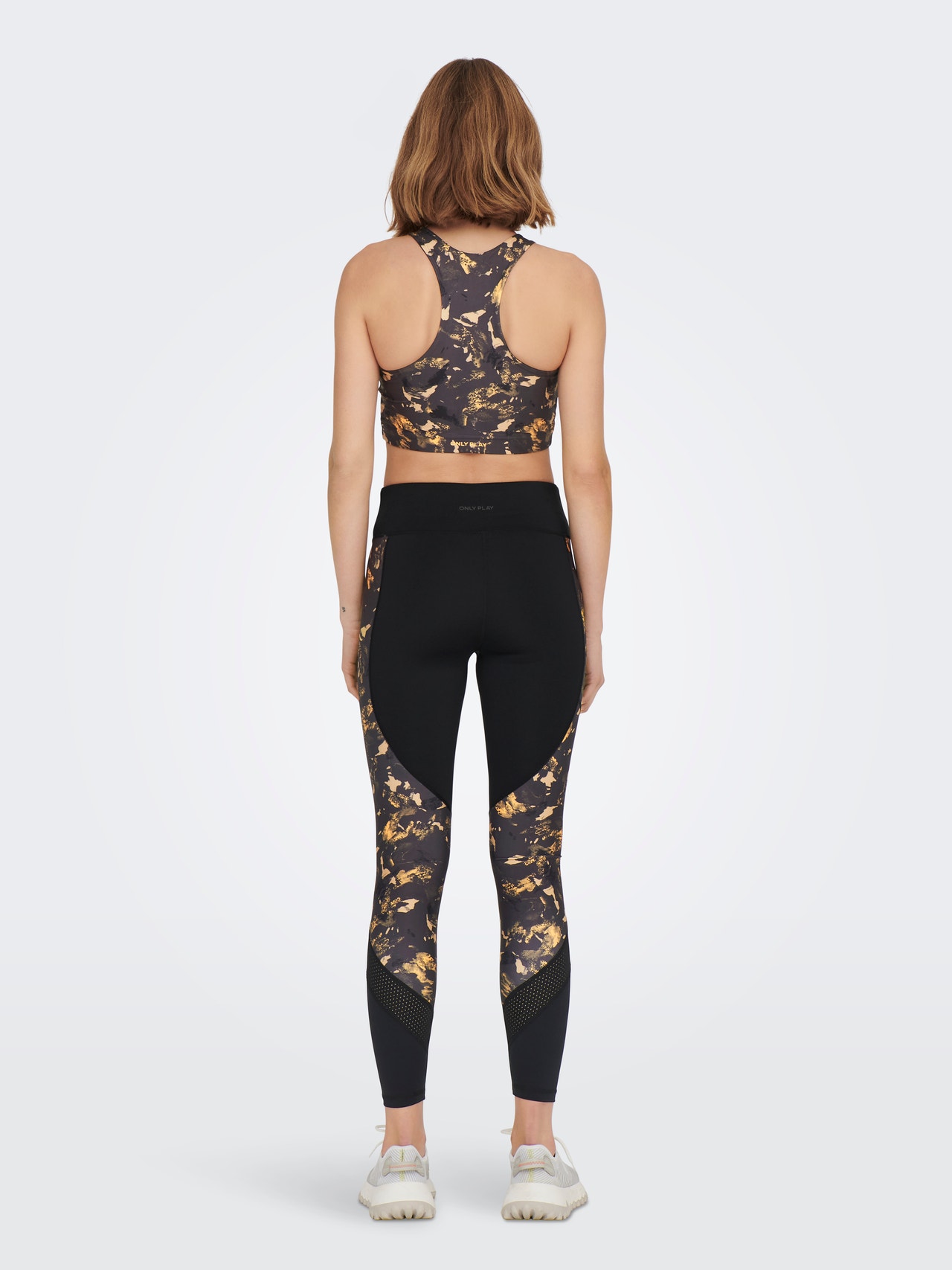 Nike gold and Black floral performance leggings