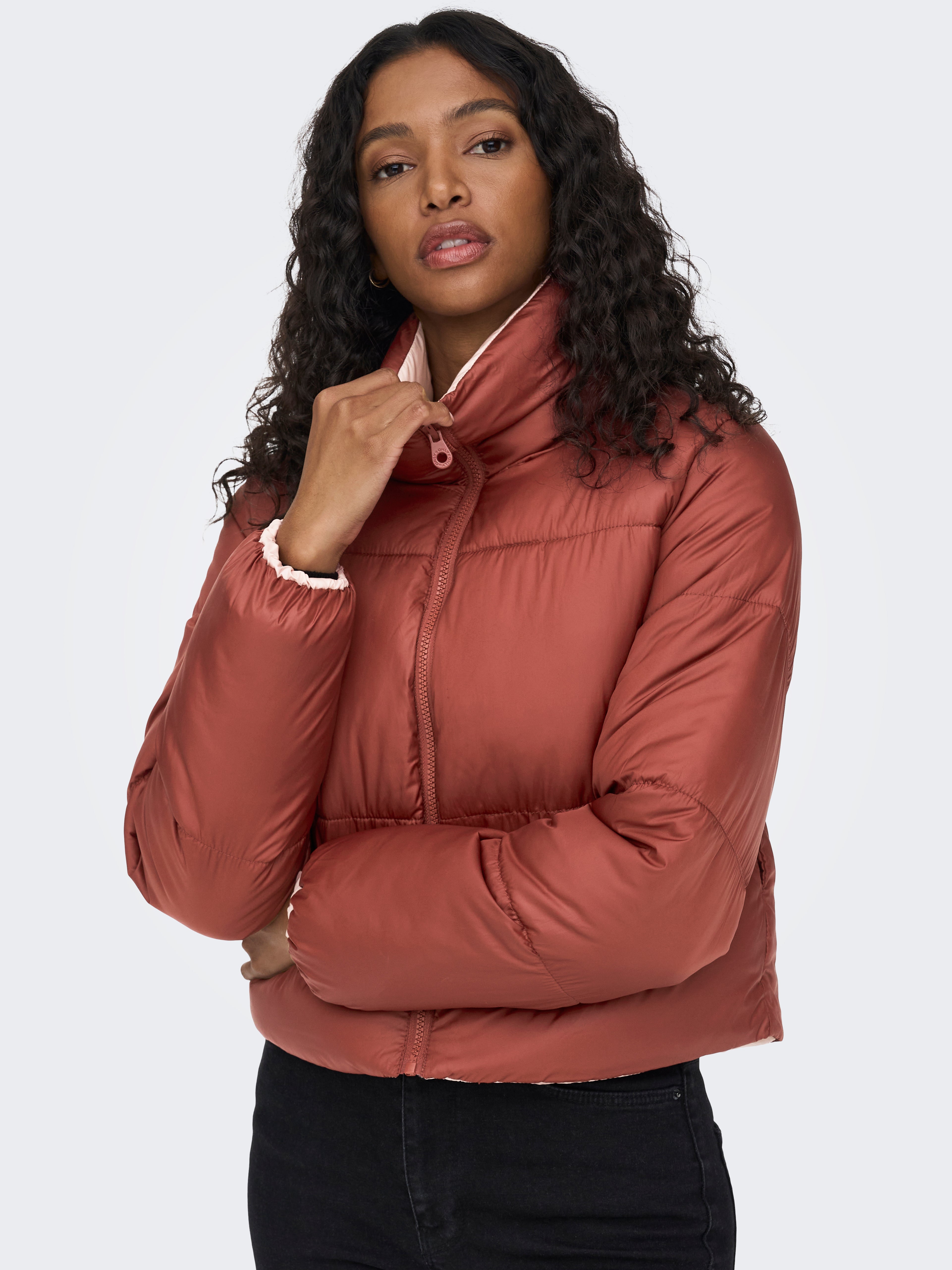 Jacket with clearance zipper on collar