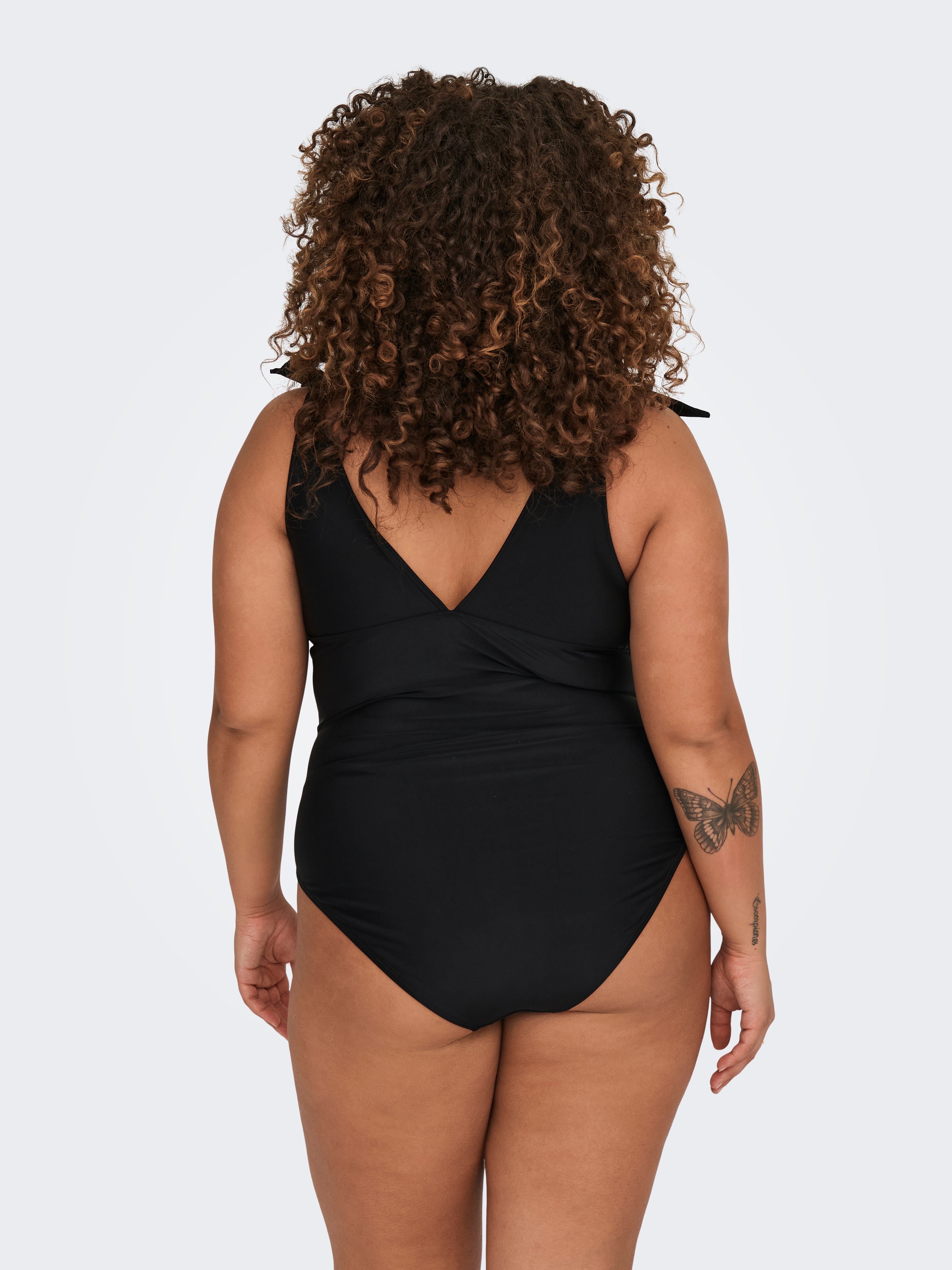 Racerback provides postural support Swimwear Black ONLY