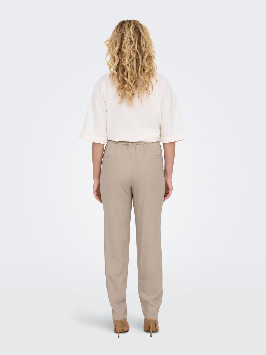 Relaxed Fit Trousers - Light beige - Men | H&M IN