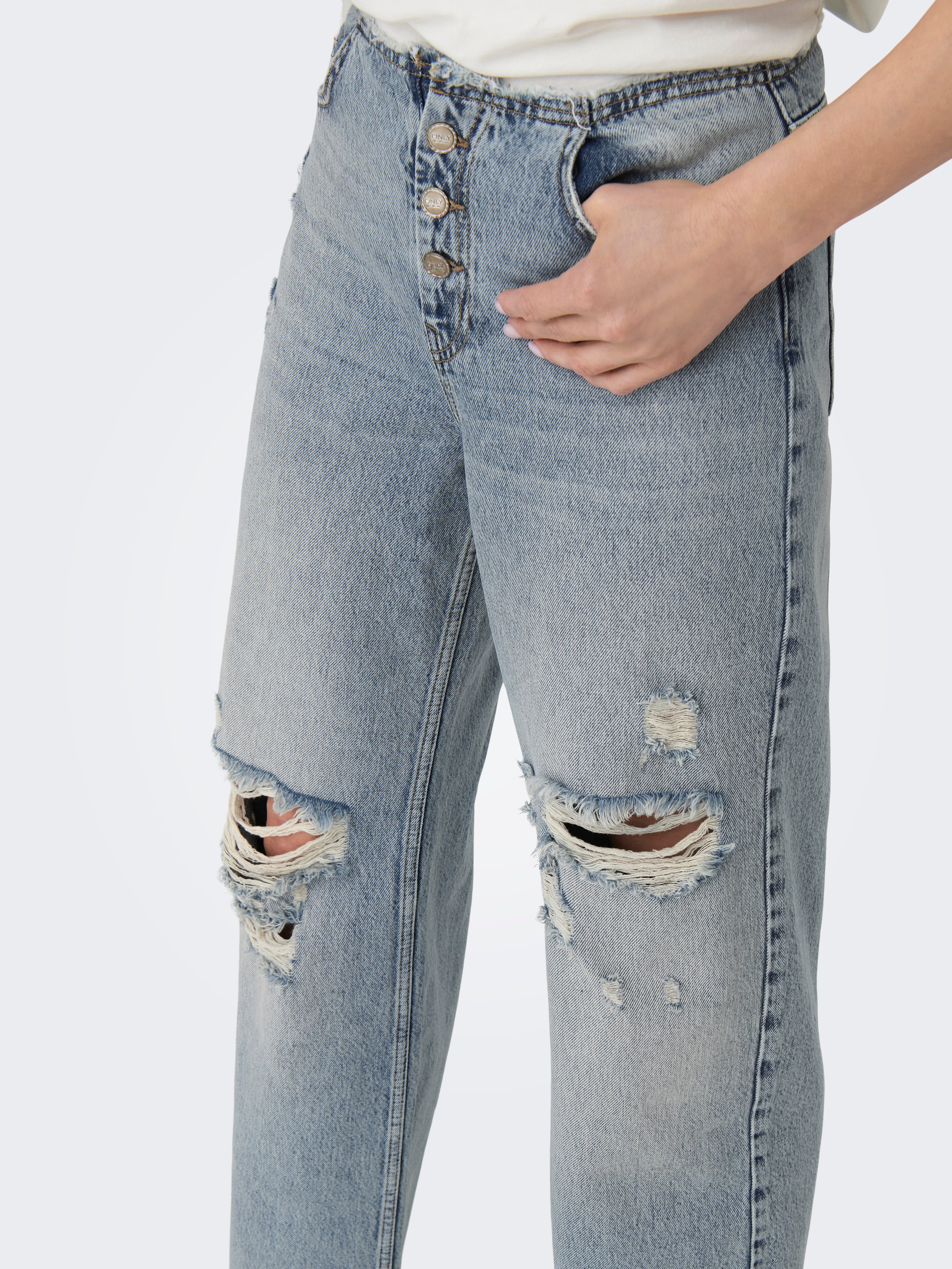 Mid wash store ripped mom jeans