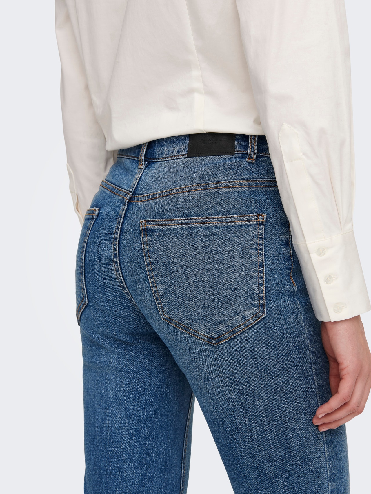 Flared Fit Mid waist Jeans with 20% discount!