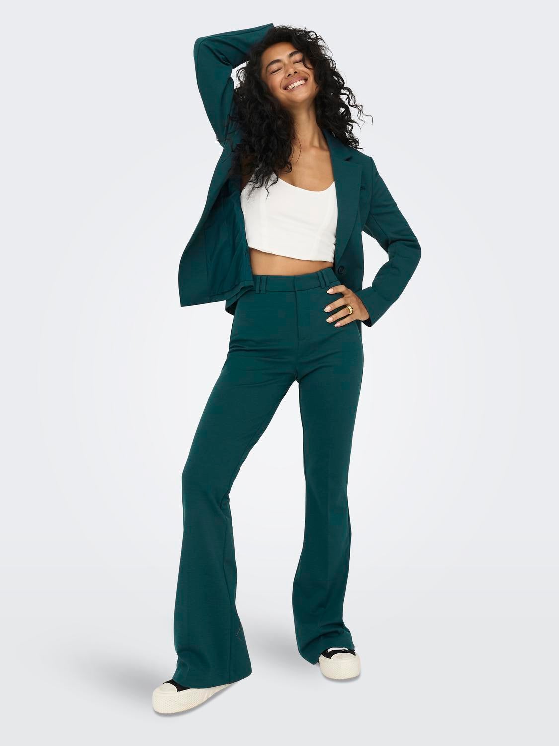 Emerald green flared sales trousers